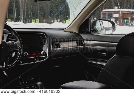 Moscow, Russia - January 30, 2021 Mitsubishi Outlander Dark Interior Close Up View. Third Generation