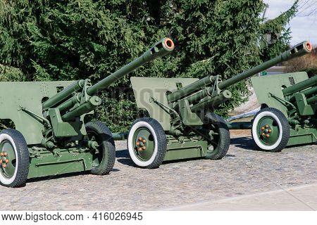 View Of The Russian Cannons And Howitzers In A Park. Military Museum Outdoors