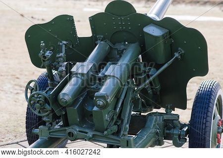 View Of The Russian Cannons And Howitzers In A Park. Military Museum Outdoors