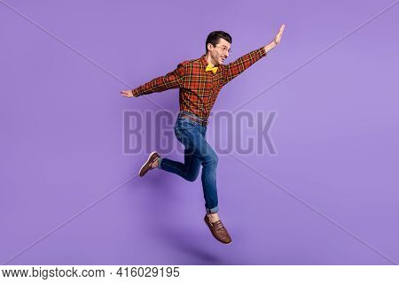 Profile Photo Of Funky Guy Jump Rush Raise Hand Look Empty Space Wear Glasses Bow Tie Plaid Shirt Is