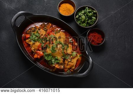 Moroccan Fish  With Chermoula, Red Peppers And Preserved Lemon. Spicy Traditional  Moroccan Food