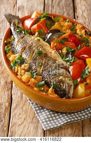 Thieboudienne Fish And Rice The National Food Of Senegal Closeup In The Dish On The Table. Vertical