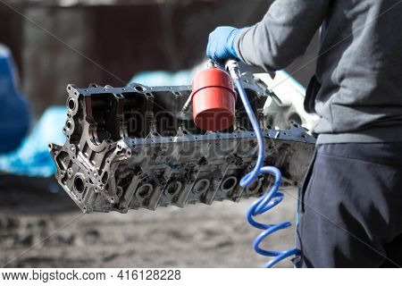 Washing The Engine Block. Disassembled Engine From The Car.