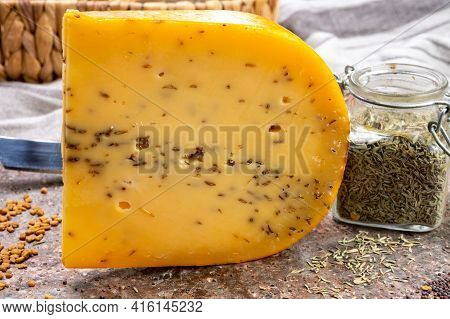 Cheese Collection, Piece Of Hard Yellow Dutch Gouda Cheese With Dried Caraway Or Cumin Seeds