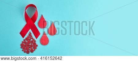 Awareness Oncept With Blood Drop And Red Ribbon. World Hamophilia Day Or Blood Donor Day