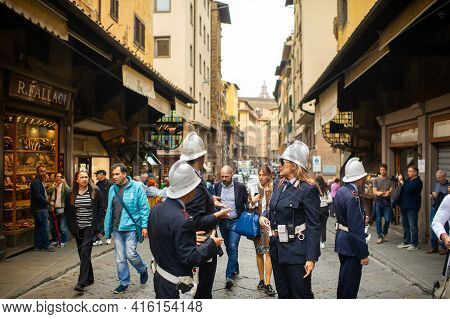October 11, 2018.tuscany.italy.florence: Police And Tourists On The Ponte Vecchio Bridge