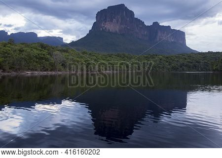 Sunset In The Canaima National Park And Reflections In The Water Of The Gauja River. Bolivar State, 