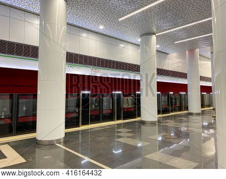 Perspective View Of High Speed Train With Opened Automatic Doors At The Platform Railway Station Wit