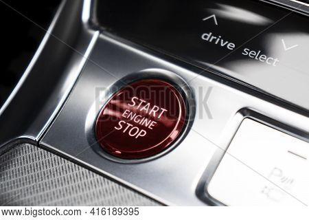 Car Dashboard With Focus On Engine Start Stop Button. Modern Car Interior Details. Start/stop Button