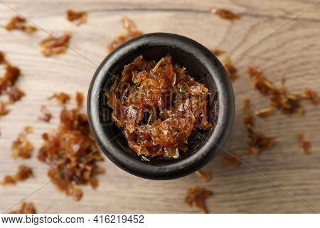 Clay Bowl Of Hookah With Aromatic Tobacco On Wooden Table, Top View