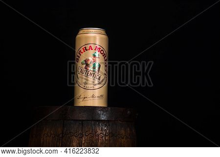 Can Of Birra Moretti Beer On Wooden Barrel With Dark Background. Illustrative Editorial Photo Buchar