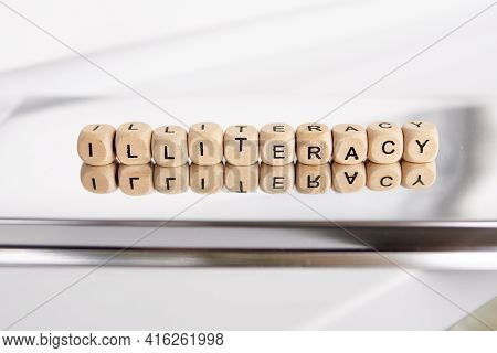 Word Illiteracy By Woonde Cubes. It Is A Portion Of A Population Unable To Read, Generally Given As 