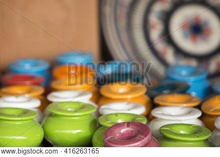 Small Coloured Ashtrays - Handcrafts Shot At The Market In Morocco