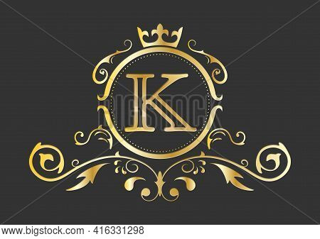 Golden Stylized Letter K Of The Latin Alphabet. Monogram Template With Ornament And Crown For Design