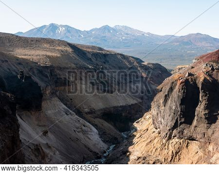 View Of The Opasny Canyon Near The Mutnovsky Volcano. The Depth Of The Canyon Surprises With Its Sca