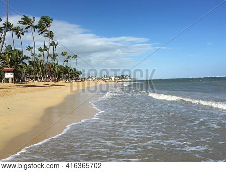PUNTA CANA, DOMINICAN REPUBLIC - DEC 20, 2016: Beach at Dreams Resort and Spa, Punta Cana. The resort is one of several properties in the AMResorts Collection.