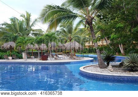 PUNTA CANA, DOMINICAN REPUBLIC - DEC 21, 2016:Pool at Dreams Resort and Spa, Punta Cana in the Dominican Republic. The resort is one of several properties in the AMResorts Collection.