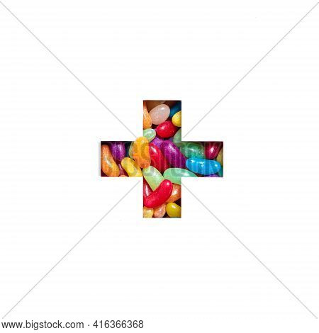 Plus Summation Sign Or Cross Of Colourful Sweet Bonbons And Cut Paper Isolated On White. Candy Typef