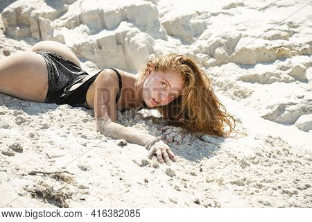 Sexy Summer Girl. Woman Lying In Sand On Beach. Vacation At Paradise. Summetime Mood