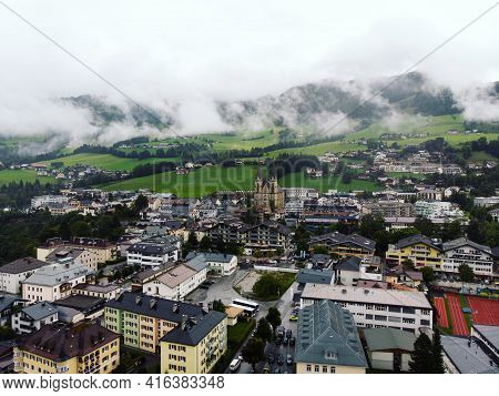 Aerial Panorama View Of Alpine Mountain Town Village City St. Johann Im Pongau With Cathedral Dome I
