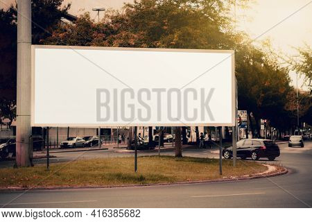 A Huge Rectangular White Empty Advertising Billboard Template On The Beltway; A Mock-up Of A Blank A