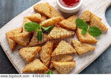 Asian Traditional Prawn Toast With Sesame Seeds And Sweet Chilli Sauce On Wooden White Board