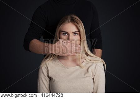 Tyranny, Psychological Pressure And Discrimination Concept. Male Closes Mouth Of Female