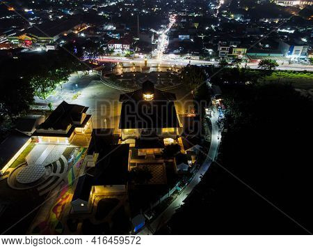 Aerial Drone View Of Monument Gedung Juang Is One Of Historical Building In Tambun At Night. Bekasi,