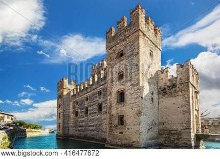 Sirmione, Italy - September 29, 2018: View Of The Medieval Rocca Scaligera Castle In Sirmione Town O