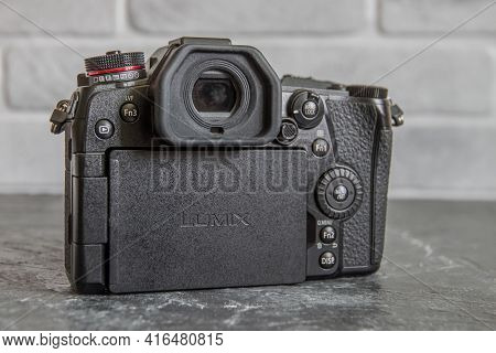 Russia, Krasnodar - April 2, 2021: Professional Japanese Mirrorless Digital Camera Panasonic Lumix G