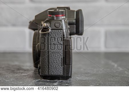 Russia, Krasnodar - April 2, 2021: Professional Japanese Mirrorless Digital Camera Panasonic Lumix G