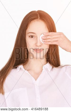 Pretty Girl Indoor Portrait. Light Background. Female Teenager Person. Long Brow Hair. Cleansing Dir