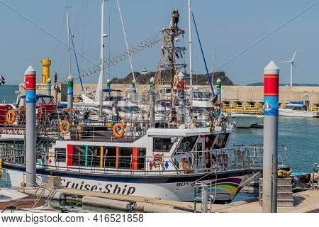 Pyeongtaek, South Korea; April 6, 2021: Fishing Boats Moored To Floating Dock At Jeongok Port.