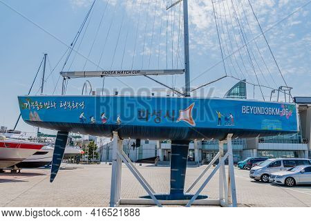 Pyeongtaek, South Korea; April 6, 2021: Korea Match Cup Sailboat On Metal Storage Rack In Parking Lo