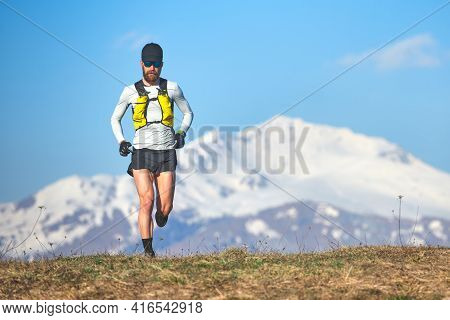 Long Distance Runner In The High Mountains