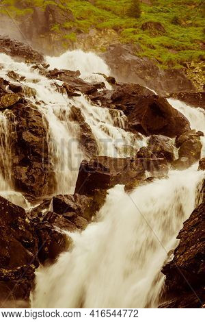 Norwegian Landscape. Waterfall Latefoss Latefossen, Odda Hordaland County In Norway. National Touris