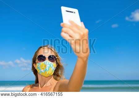 Funny Girl Taking Selfie Photo By Smartphone On Tropical Sea Beach. New Rules To Wear Cloth Face Cov