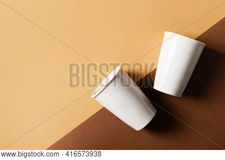 Mug Or Cup Of Coffe To Go Porcelain On Brown Background, Creative Pastel, Zero Waste Concept, Top Vi