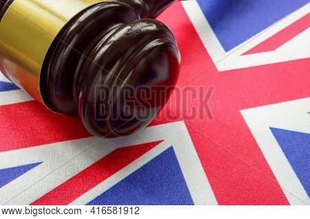 Justice In Britain Concept. British Flag And Gavel.