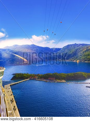People Flying At High Zipline On Caribbean