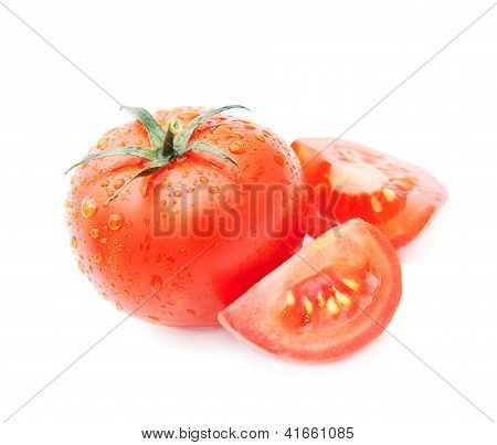 Fresh Tomato And Tomato Slice With Water Drops Isolated On White