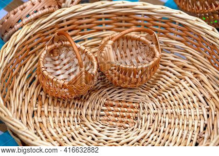 Two Small Wicker Baskets Made Of Natural Vines Are Already Inside The Large Basket. Wicker Baskets M