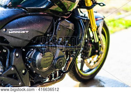 Detail Of Black Motorcycle. Honda Hornet Motorcycle Detail Photo In Bucharest, Romania, 2021