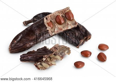 Ripe Carob Pods And Bean Isolated On White Background With Clipping Path And Full Depth Of Field