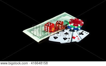 Set Or Three Of A Kind Cards Combination And Dollars With Chips. Winning Combination At A Poker Club