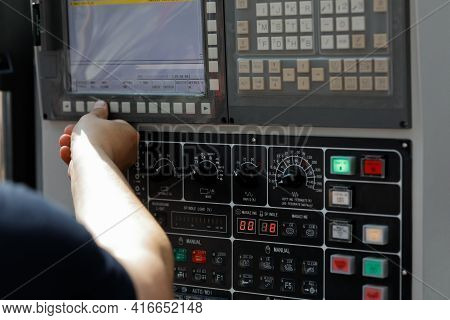 Operator Sets Up The Work Of The Cnc Machine. Selective Focus.