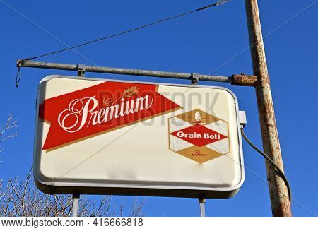 Kragnes, Minnesota, April 9, 2021:  The Sign Advertises Premium Beer By Grain Belt  Brewed In Minnes