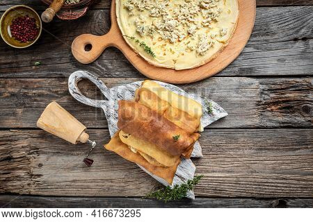 Stuffed Pancakes Or Crepes Rolls With Chicken Meat And Cheese. Banner, Menu Recipe Place For Text, T