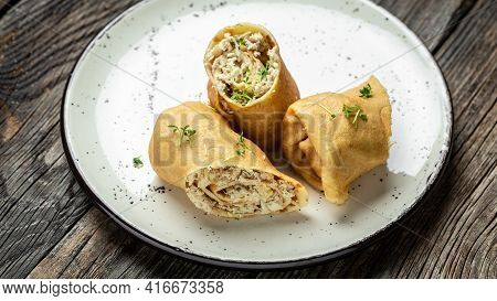 Stuffed Pancakes Or Crepes Rolls With Chicken Meat And Cheese. Banner, Menu Recipe Place For Text, T