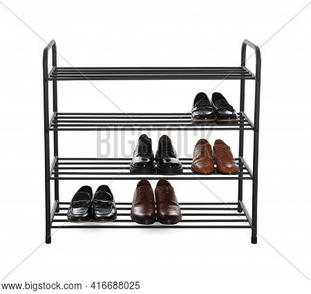 Stylish Shelving Unit With Different Pairs Of Shoes On White Background. Storage Idea